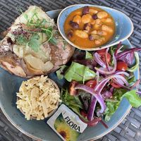 Jacket potato with 3 bean chilli and vegan cheddar  at Cafe Nucleus in Chatham