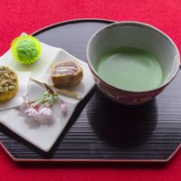 Example of the Ladies set. Zunda mochi (sweetened edamame over pounded mochi rice), Matsushima (red bean with cream cheese "waves"), and squash cake with green matcha tea. at Kanrantei Tea House in Matsushima