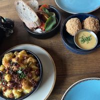 Leek and bacon arancini, tomato and feta salad, Mac and cheese with chorizo   at The Tipsy Vegan in Cambridge