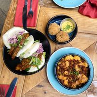 Korean bao buns, arancini, macaroni with chorizo  at The Tipsy Vegan in Cambridge