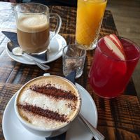 Soy cappuccino, oat latte, orange juice and hibiscus juice at The Tipsy Vegan in Cambridge