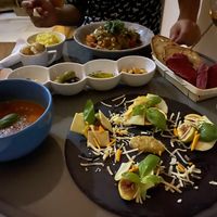 Fig salad, gazpacho, olives, bread and chickpea curry  at Hortela in Portimao