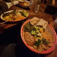 On the left gluten free vegan plate with kvinoa and on the the right the usual one. at Im Herzen Afrikas in Frankfurt