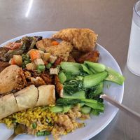 Plate by weight + young coconut water at Dharma Realm Guan Yin Sagely Monastery in Kuala Lumpur