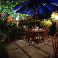 Outside seating area at The Guava Limb in San Ignacio