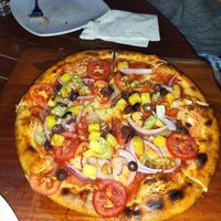 Hawaiian vegan pizza, they modified it at The Guava Limb in San Ignacio