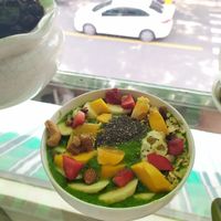 Smoothie bowl - spinach, cucumber, mango and toppings at Juicy in Ho Chi Minh City
