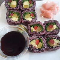 Sushi rolls with soy sauce, pickled ginger, and wasabi  at Kaya Vegan Foods in Surbiton