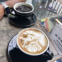 Latte with oat milk from next door Frisson  at Fresh From Hell in New York City