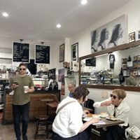 Seating at NextDoor coffee shop that they allow you to bring food in to  at Fresh From Hell in New York City