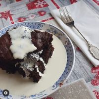 Chocolate, cherry & almond brownie with Elmlea cream. at Chocolate Orange Tearooms in Worksop