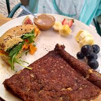 Half a vegan bagel and half vegan pancake with peanut butter at Goldig in Lagos