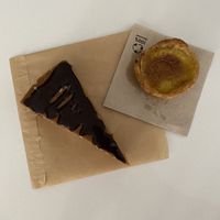 Salted caramel chocolate tart and Portuguese tart  at Goldig in Lagos
