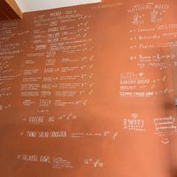 Menu on the wall inside the place  at Goldig in Lagos