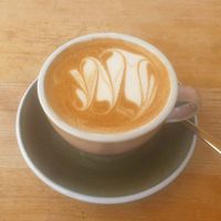 Cappuccino with oat milk at Goldig in Lagos