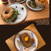Bagel with vegan cream cheese, vegan toast, daily special (Moroccan curry), and banana bread.  at Goldig in Lagos