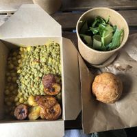 Chickpea curry, lentil stew, plantains, avocado and olive salad and a dumpling 💜 SO delicious  at Eat of Eden in South West London