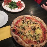 14 Euro pizza and 8 Euro for two sad bruschetta pieces. Looks good. Tasted fine at Vaelsa in Helsinki