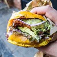 Seitan schnitzel:
Deep fried and breaded seitan served with chipotle mayonnaise, lettuce, tomato, dill gherkins and red onion. at Vburger Camden in North West London