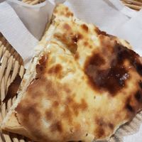Naan with vegan cheese and mushrooms at Sanskar Nepal in Lisbon