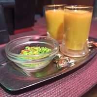Mango shot offered by the restaurant at Sanskar Nepal in Lisbon