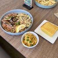 build a bowl w jerk chickn, cornbread, jerk mac n cheese  at Dajen Eats in Eatonville