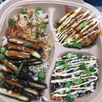 Rice and peas, jerk chicken and red cabbage salad at Dajen Eats in Eatonville