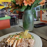 Jamaican Rice & Peas, Crispy Fried Chick’n, Rainbow Slaw and grilled pineapple! at Dajen Eats in Eatonville