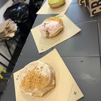 Cinnamon scroll, pistachio rose, matcha strawberry  at Crosstown Doughnuts - Shoreditch in East London