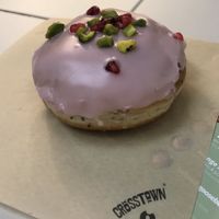 Orange blossom with pistachio and pomegranate  at Crosstown Doughnuts - Shoreditch in East London