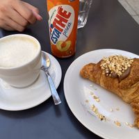 Vegan cappuccino, and vegan croissant with hazelnut cream (vegan Nutella)  at Coccodi il Dolce e il Salato in Cagliari