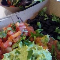 vegan burrito bowl with extra beans instead of rice; small salad in background at Bubby's Take Away Kitchen in Red Hook