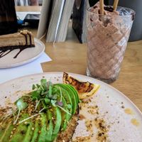 Avo toast (minus the feta) and a choc maple frappe at Nude Sisters Whole Food Kitchen in Gold Coast