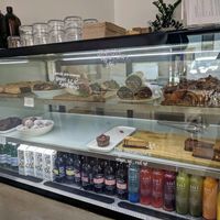 Sausage rolls, wraps, pies, cakes - all vegan at Nude Sisters Whole Food Kitchen in Gold Coast
