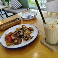 Banana Mango smoothie with tofu and fried mushrooms, onion and potato at Hua Hin Vegan Cafe and Wine in Hua Hin