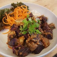Japanese Sweet Potato & Peanut Sauce. I would not order again. Very dry, chalky potato with thick peanut butter. Couldn't eat it. Chewy and thick.  at Hua Hin Vegan Cafe and Wine in Hua Hin