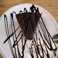 Lovely vegan chocolate cake (one little bit already eaten by me) at Hua Hin Vegan Cafe and Wine in Hua Hin