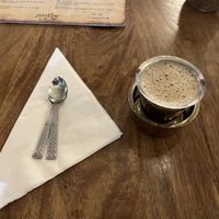 Filter coffee with oat milk   at Justbe by Nidhi Nahata in Bangalore