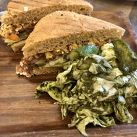 Falafel sandwich with pesto dressed salad. at Justbe by Nidhi Nahata in Bangalore