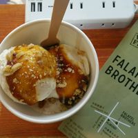 Vegan ice cream (¥600+tax): made with coconut milk and topped with almonds and date syrup. Amazing, amazing, and with two big scoops. at Falafel Brothers - Minato in Tokyo