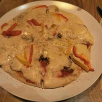 Vegan sausage pizza with cashew cheese. at Tribe Organic in Shanghai