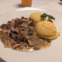 Polenta with mushrooms at Ladin & El Tobià in Vigo Di Fassa