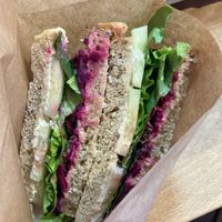 My delicious sandwich: umeboshi marinated beetroot, hummus, cucumber, sprouts, salad at Tapas del Huerto in Tenerife