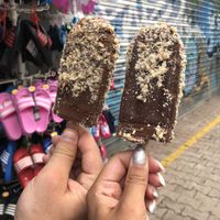 Chocolate banana bar, fully dipped and topped with crushed hazelnut topping! at Stixberry in Split