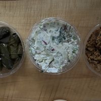 Stuffed grape leaves, potato salad, spiced tempeh mix (all clearly labeled as Vegan)  at The Local Grocer in North Conway