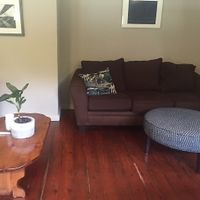 Cozy couches at The Hoot in Northport