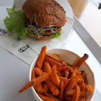 Chickpea burger with sweet potato fries at Krowarzywa - Piotrkowska in Lodz