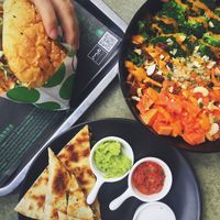 Bajaja burger, carnita quesadilla, sunrise in Phuket salad at Root Pop in Beijing