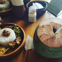 young coconut + lunch plate with all today's vegan specials! at Tulasi Vegetarian in Ubud