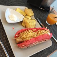 Vegetarian hotdog with pink ketchup roll at Veggie Cafe in Albufeira
